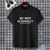 Black cotton t-shirt with 'MY WIFE IS PERFECT' text. Gildan unisex tee, perfect gift for wife. Shop at MyArtsyGift.com