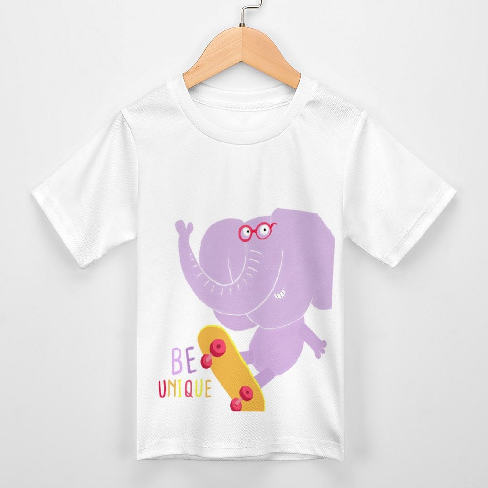 Kids' summer t-shirt with skateboarding elephant graphic and 'BE UNIQUE' text.