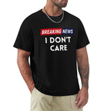 Men's black crew neck t-shirt with the text 'BREAKING NEWS I DON'T CARE'. Comfortable classic tee for men.