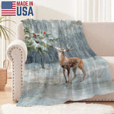 Winter woodland deer flannel blanket made in USA. Cozy snowy scene on sofa or bed.
