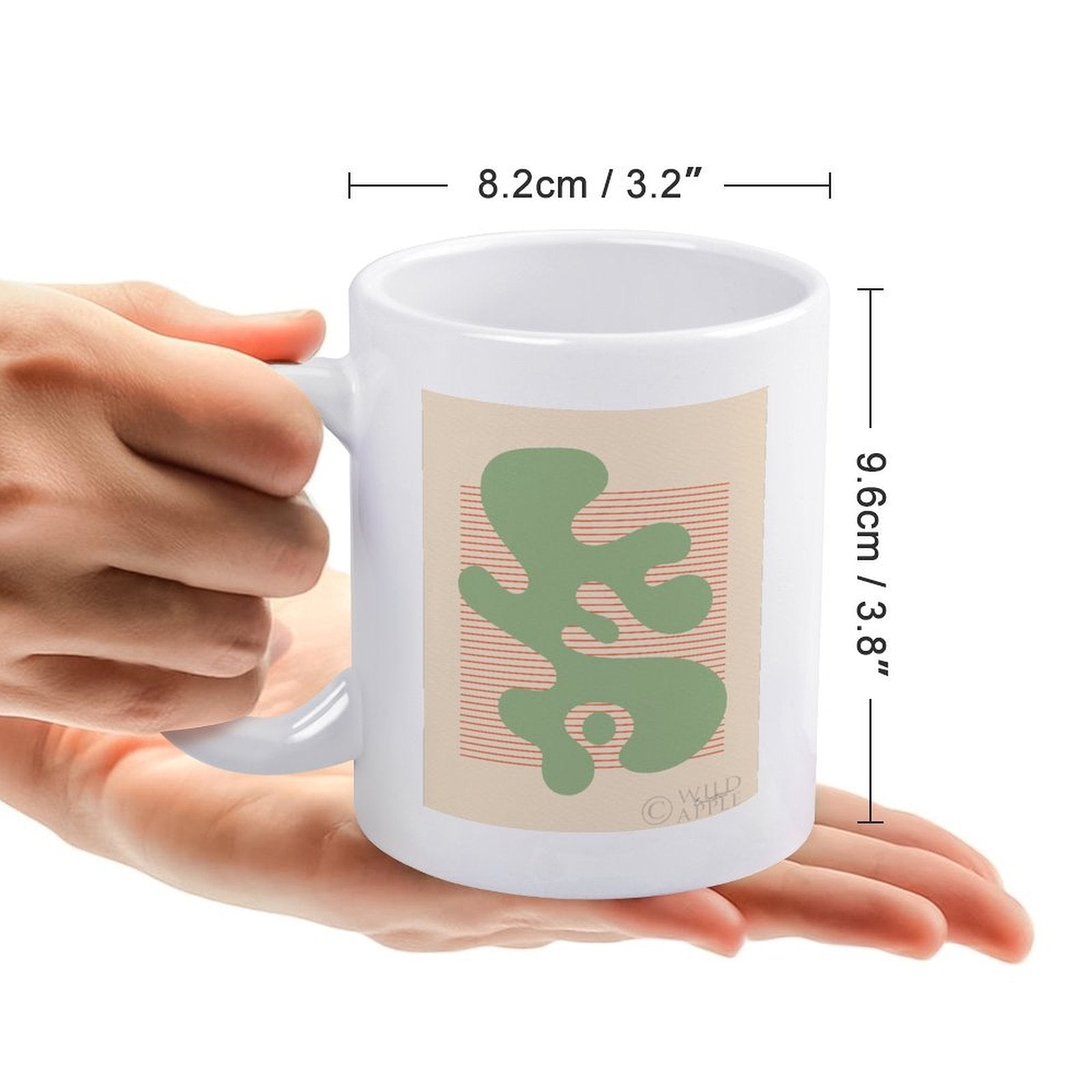 White ceramic coffee mug with green abstract design Shape Up IV by Wild Apple, a personalized gift idea from MyArtsyGift