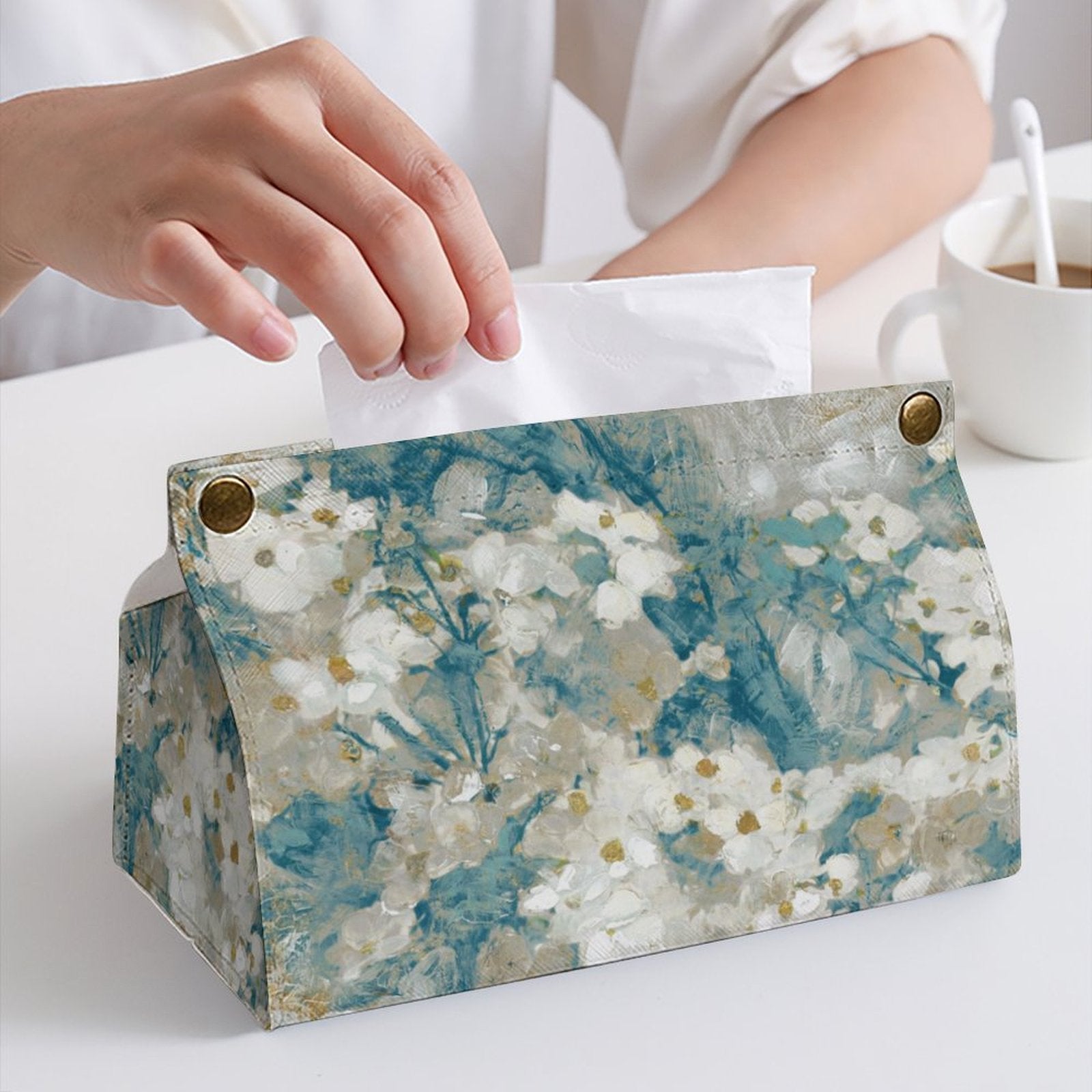 Floral PU tissue box cover in use, rectangular holder with floral art design for bathroom, kitchen or office.