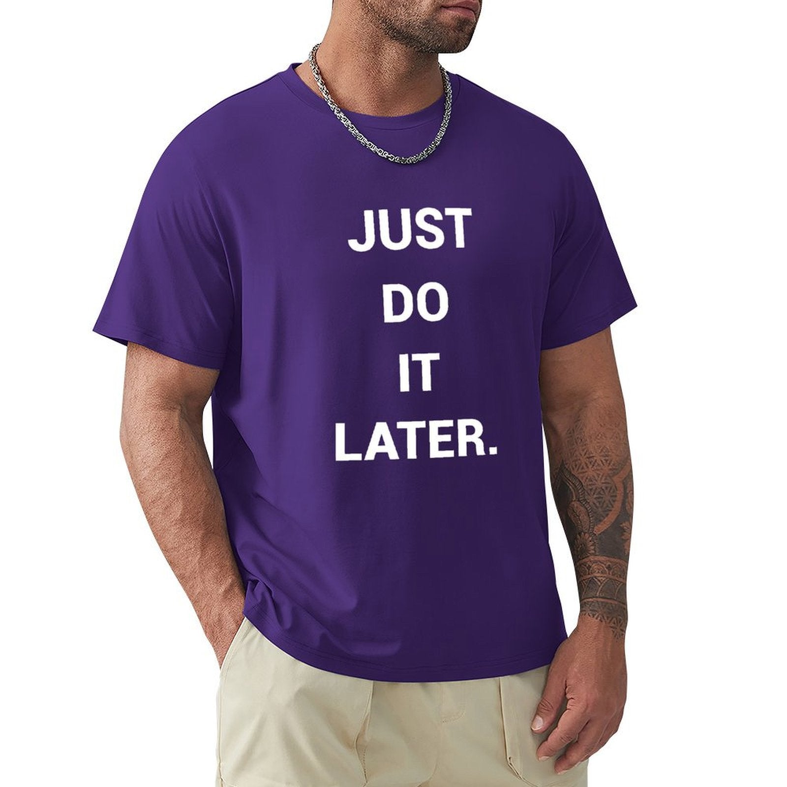 Purple men's crew neck t-shirt with "JUST DO IT LATER" print; comfortable cotton tee.