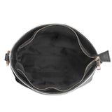 Black PU leather bucket bag interior with gold zipper and hardware. Travel tote bag.