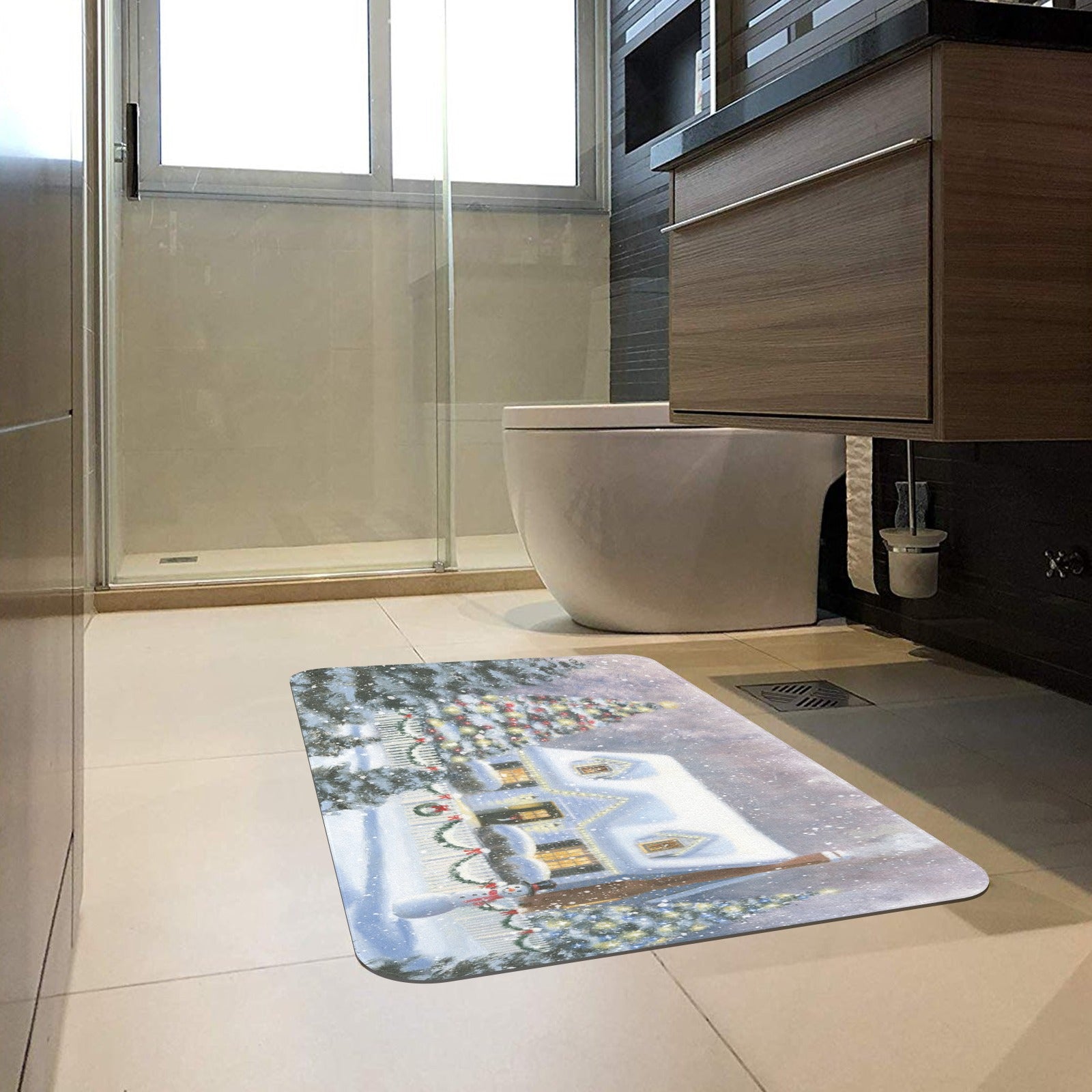 Christmas door mat with winter house and tree scene in a bathroom setting for indoor use.