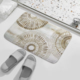 Coral velvet bath rug with sunburst design, non-slip floor carpet for bathroom.