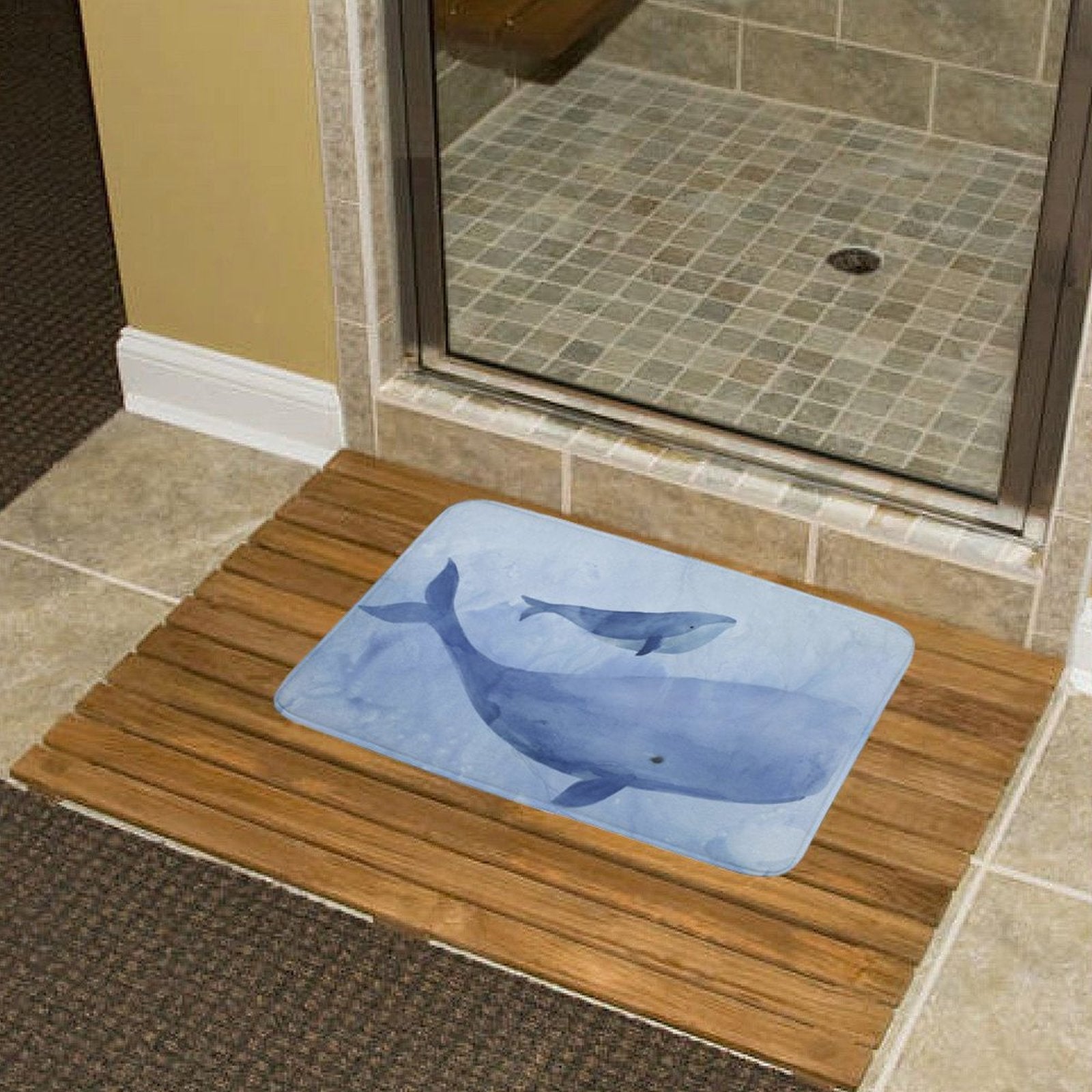 Blue whale watercolor bath rug on wooden floor mat, bathroom decor, non-slip and absorbent.