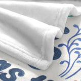 Coastal Currents V Flannel Blanket detail, soft white blanket, blue floral design.