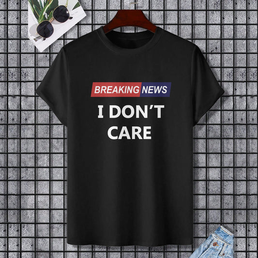 Black cotton T-shirt with "I DON'T CARE" print. Gildan Unisex Tee. Perfect for expressing individuality.