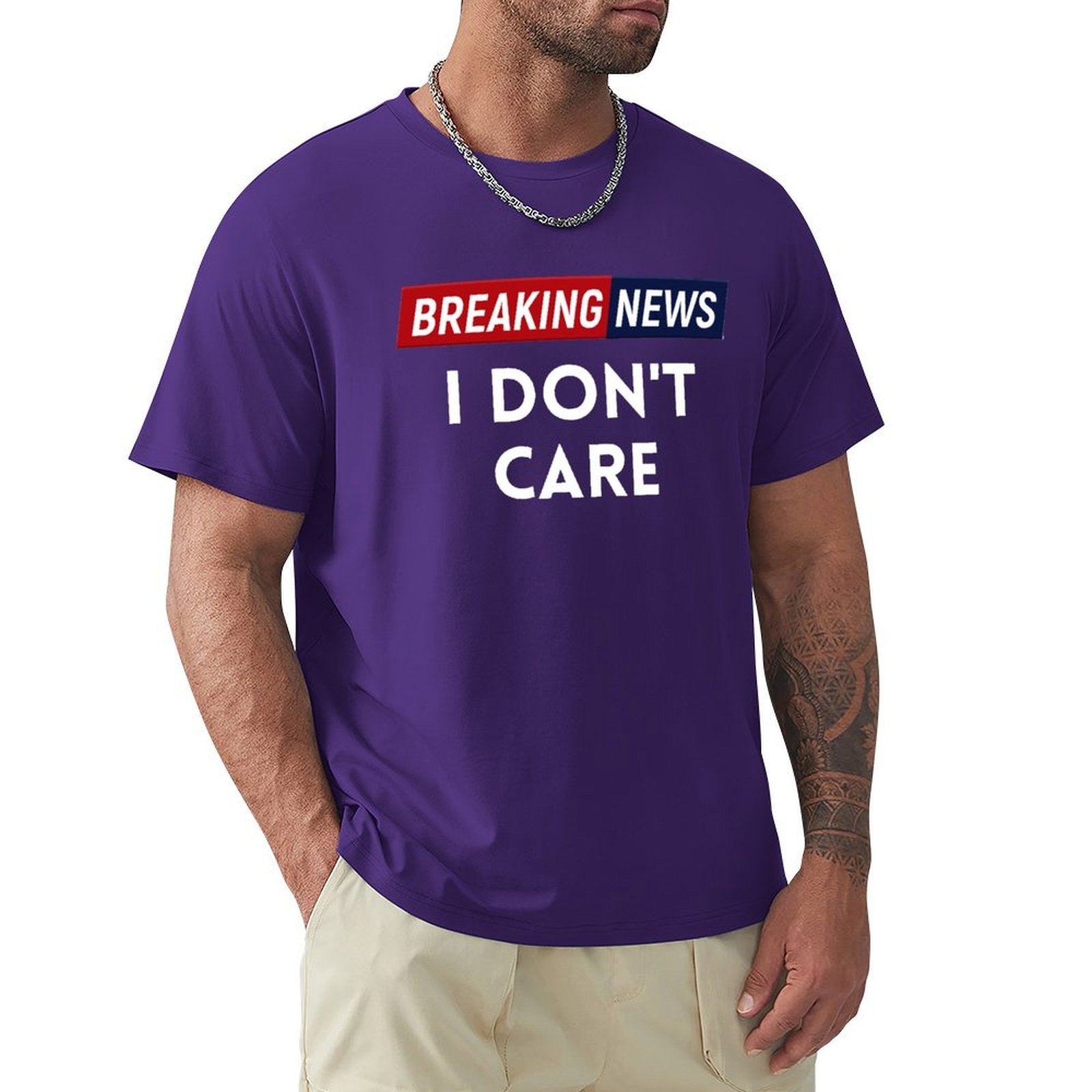 Men's purple Breaking News I Don't Care t-shirt, classic crew neck tee for men. Cotton blend, short sleeve.