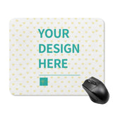 Customizable mouse pad with 'YOUR DESIGN HERE' text, heart pattern and a mouse, perfect for gifts.