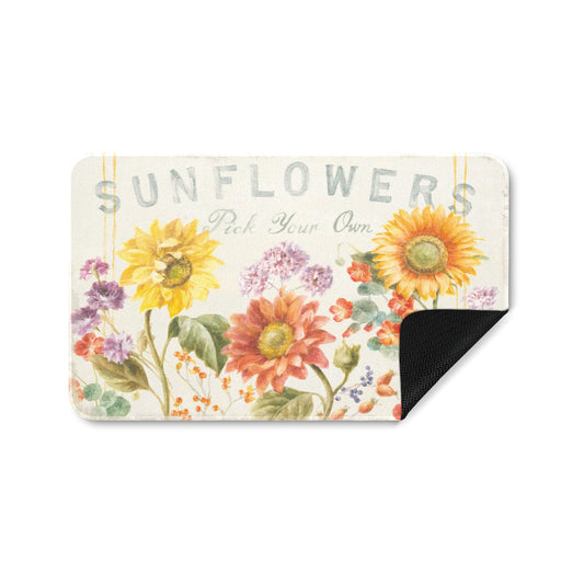 Floursack Autumn Sunflowers Door Mat, features sunflowers, and a black rubber corner.