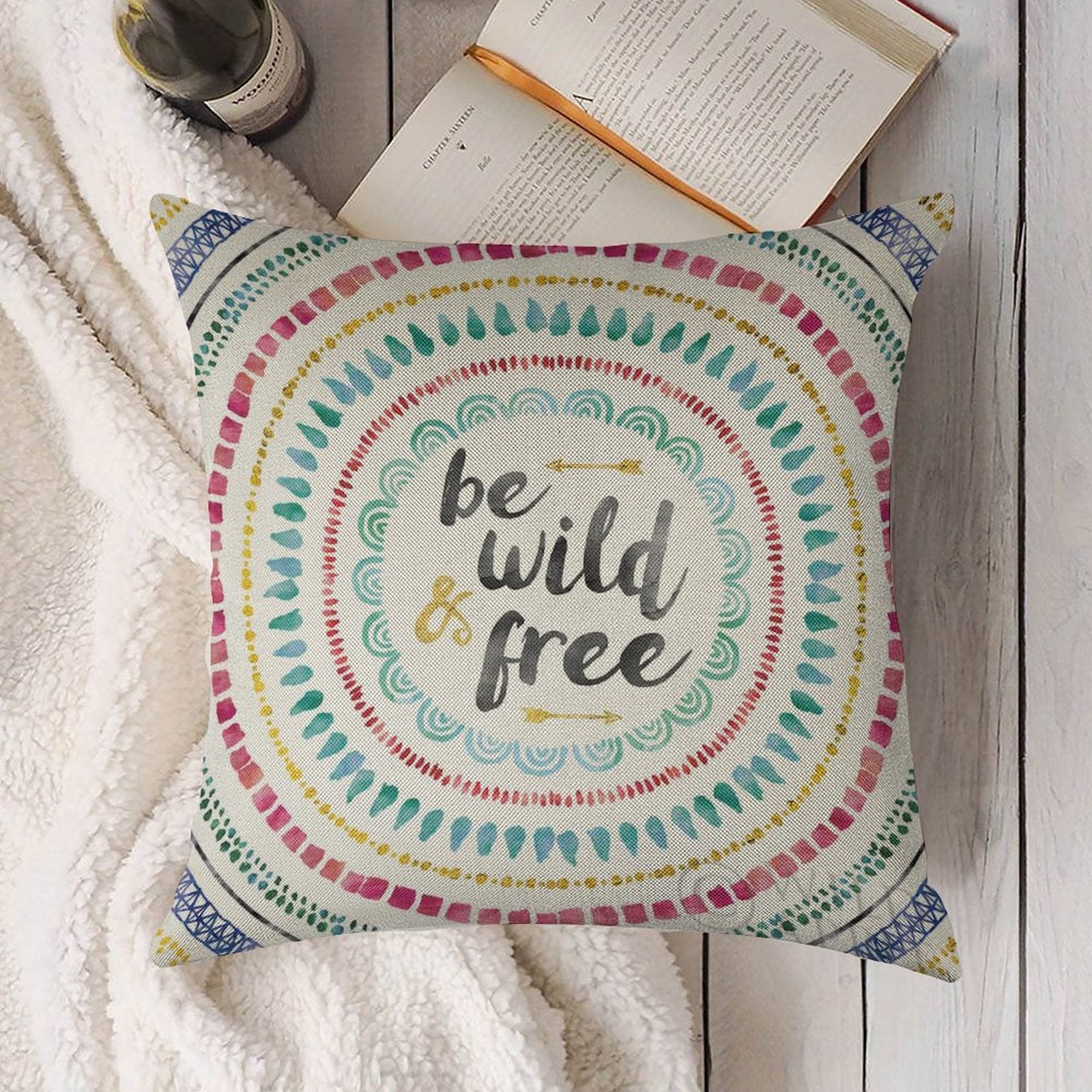 Linen pillow case with "be wild & free" text and mandala design for living room decor.