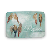 Coral velvet bathroom rug with watercolor bird design and Prince text