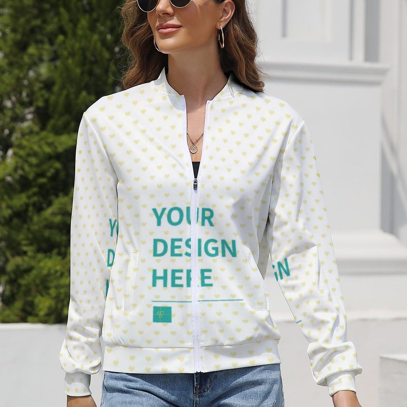 Customizable women's zip-up jacket with heart pattern, white and yellow design, features "YOUR DESIGN HERE" text.