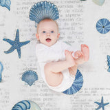 Navy shells pattern fleece blanket with a baby, seashell and starfish design, cozy blanket.