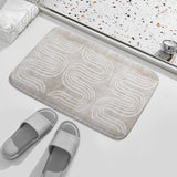 Coral velvet bath rug with abstract wave design, non-slip and quick-drying for bathroom.