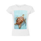 White women's t-shirt with a sea turtle graphic print, perfect for summer. Featuring a crewneck and short sleeves.