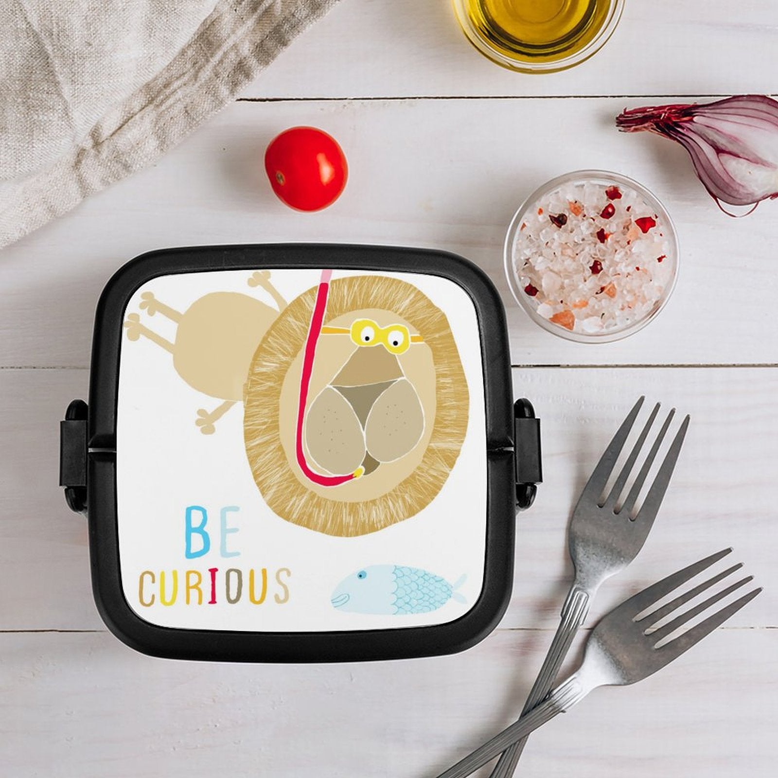 Double-layer kids' bento lunch box with lion design and BE CURIOUS text, perfect for school lunch.