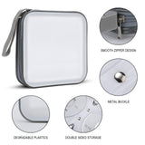 Portable CD/DVD case. Features clear plastic, smooth zipper, and metal buckle. Includes double-sided storage. Perfect for home, car, or office.