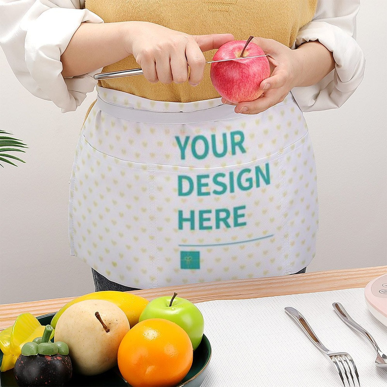 Customizable chef apron with "YOUR DESIGN HERE" and white Oxford cloth for men and women with pockets.