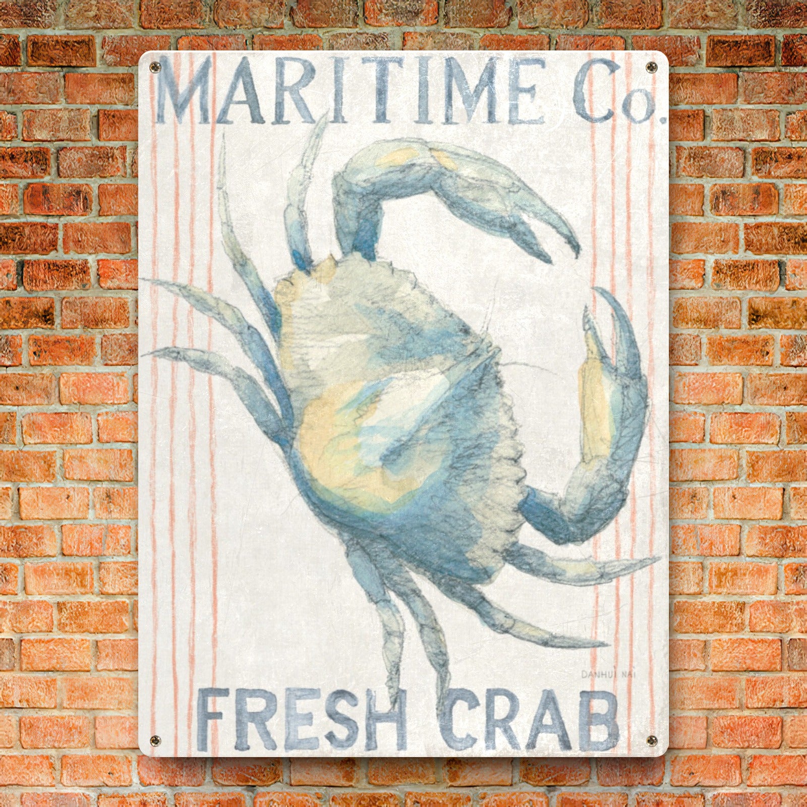 Metal sign, nautical themed kitchen decor, featuring a watercolor crab with Maritime Co. Fresh Crab text, on brick wall.