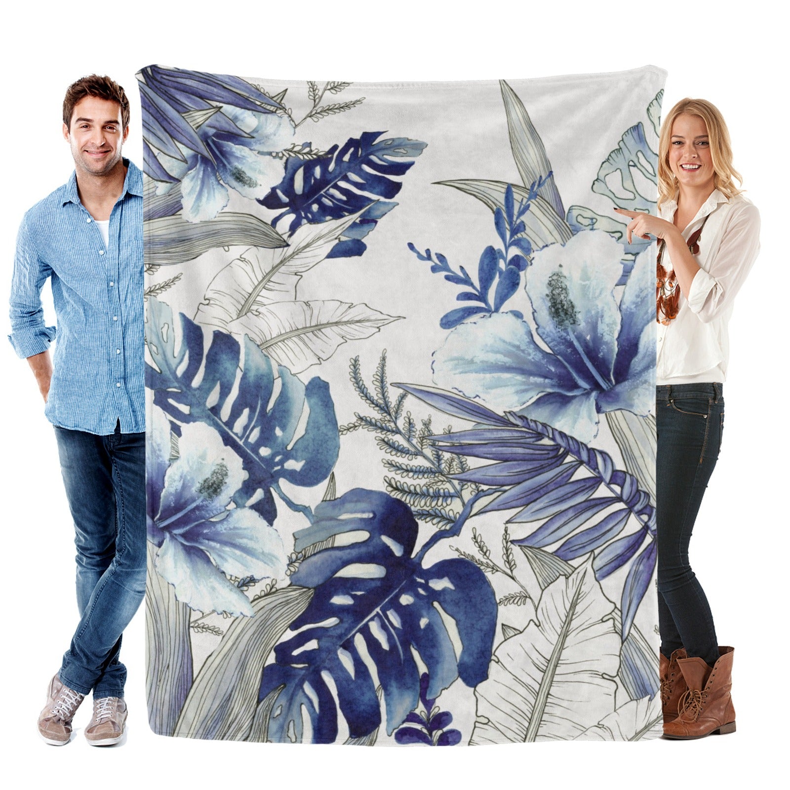 Blue Tropical Plants Flannel Blanket, soft polyester, made in USA, held by two people
