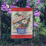 Welcome garden flag, double-sided, with floral arrangement in a USA-themed pot.