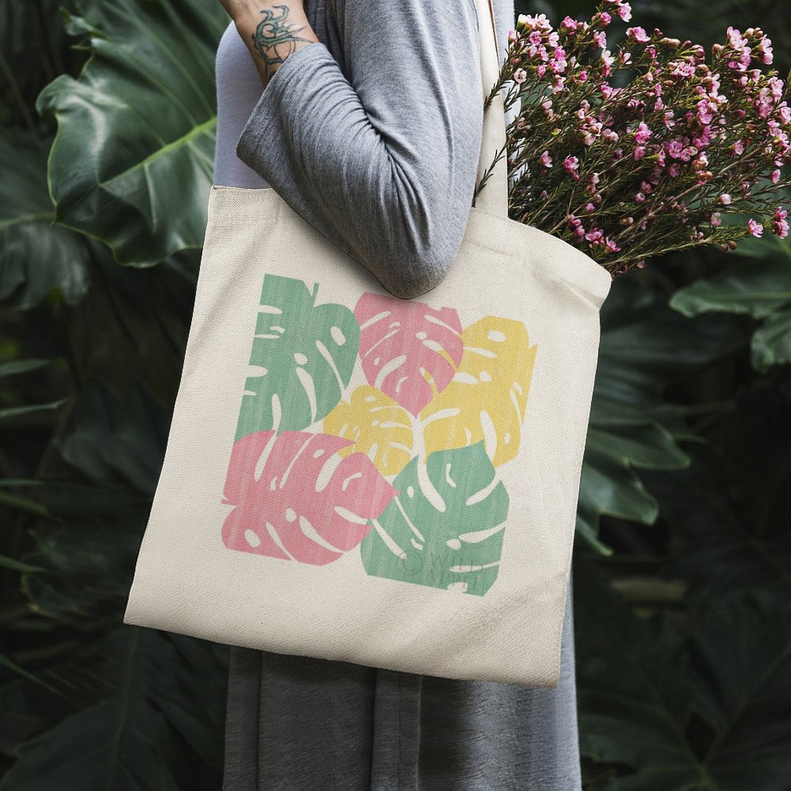 Monstera leaf print canvas tote bag, perfect for shopping, in pink, yellow, and green, cotton eco-friendly bag for women.