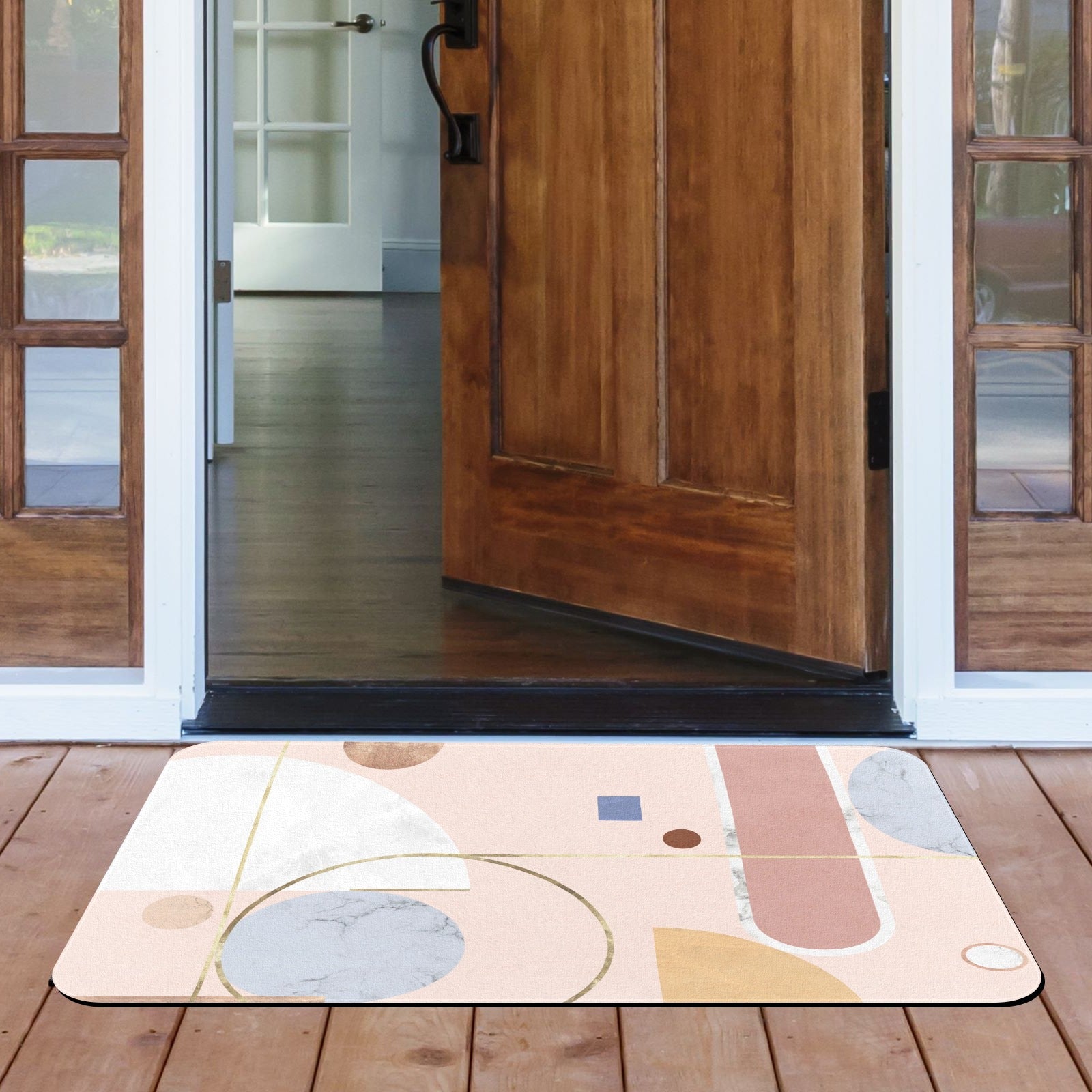 Pink abstract entrance doormat with geometric design, ideal for indoor or outdoor use.