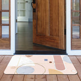 Pink abstract entrance doormat with geometric design, ideal for indoor or outdoor use.