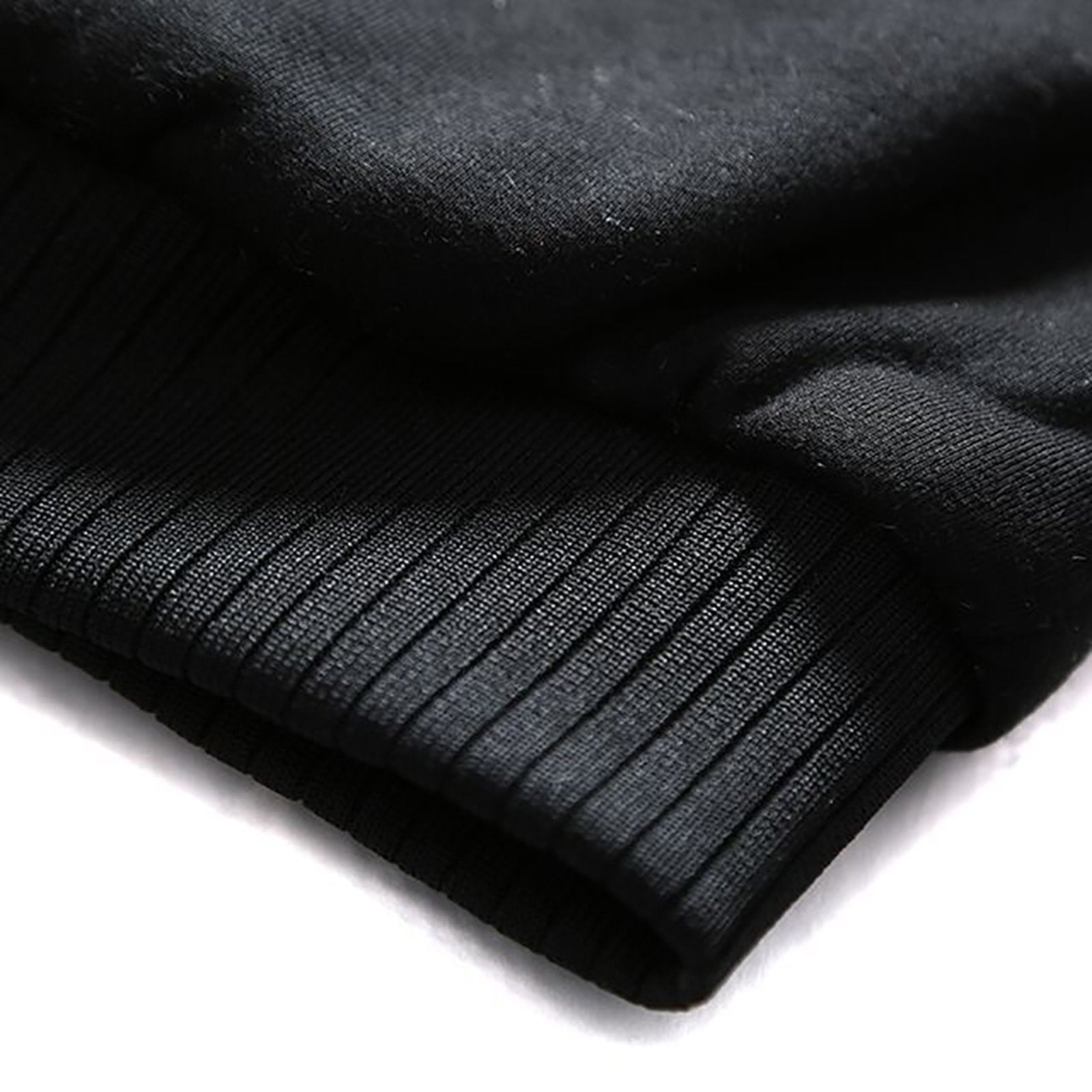 Black hoodie cuff detail in polyester fabric, part of the Custom Hoodie for Men.