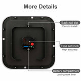 Back of a square wall clock showing details like back nail slot, time set knob and battery compartment.