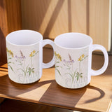 White ceramic mug with Wild Apple wildflower design, perfect for home or office, made in USA.