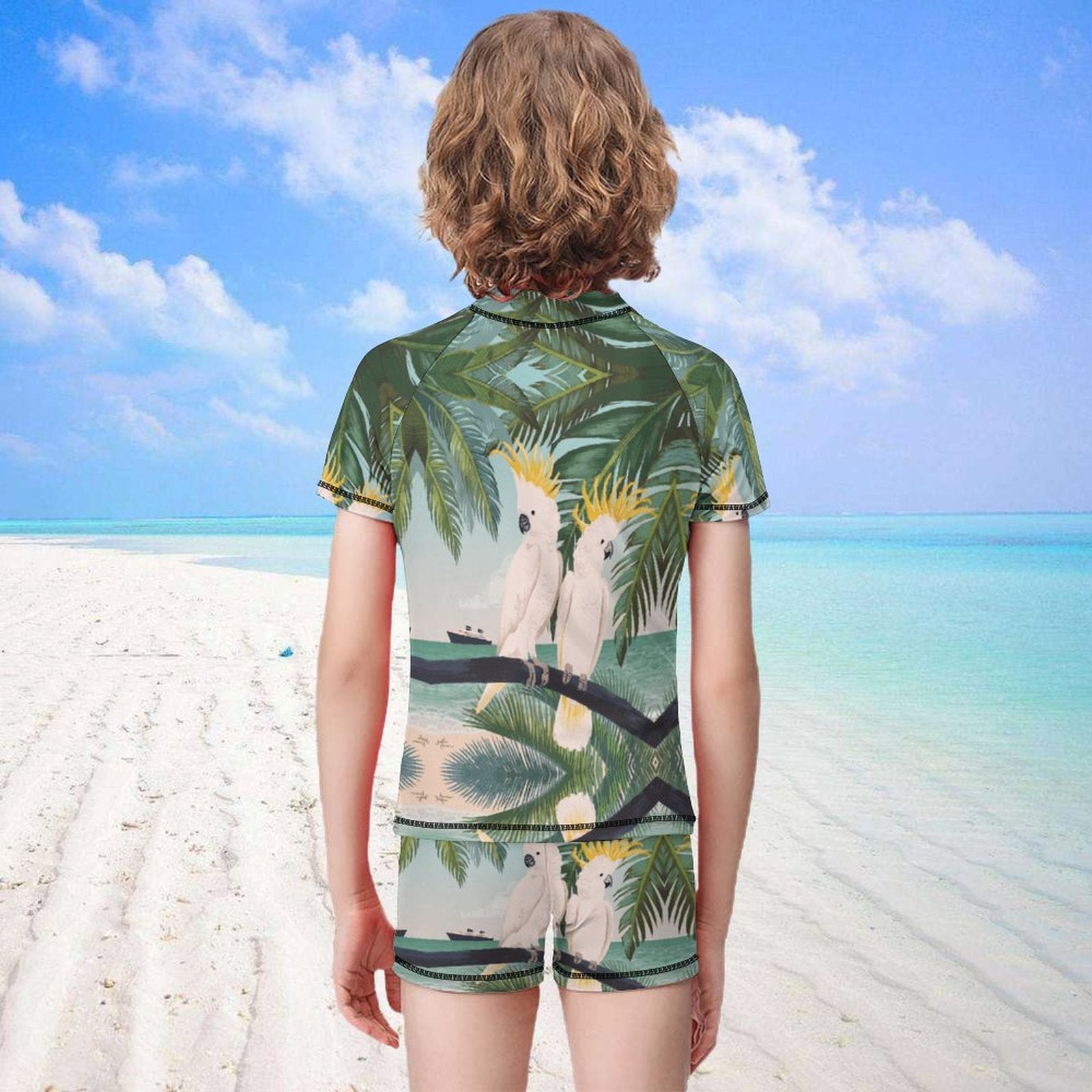 Boys' rash guard set with parrot design, polyester and spandex, perfect for summer swimming.