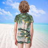 Boys' rash guard set with parrot design, polyester and spandex, perfect for summer swimming.