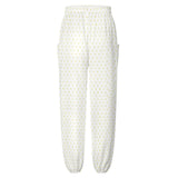 Custom white yoga pants for women with yellow heart pattern and pockets. Perfect for sports.