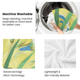 Green tropical plants flannel blanket, machine washable, soft, featuring vibrant floral design.