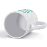 Customizable white ceramic mug with 'YOUR DESIGN HERE' text. Perfect personalized gift for men & women.