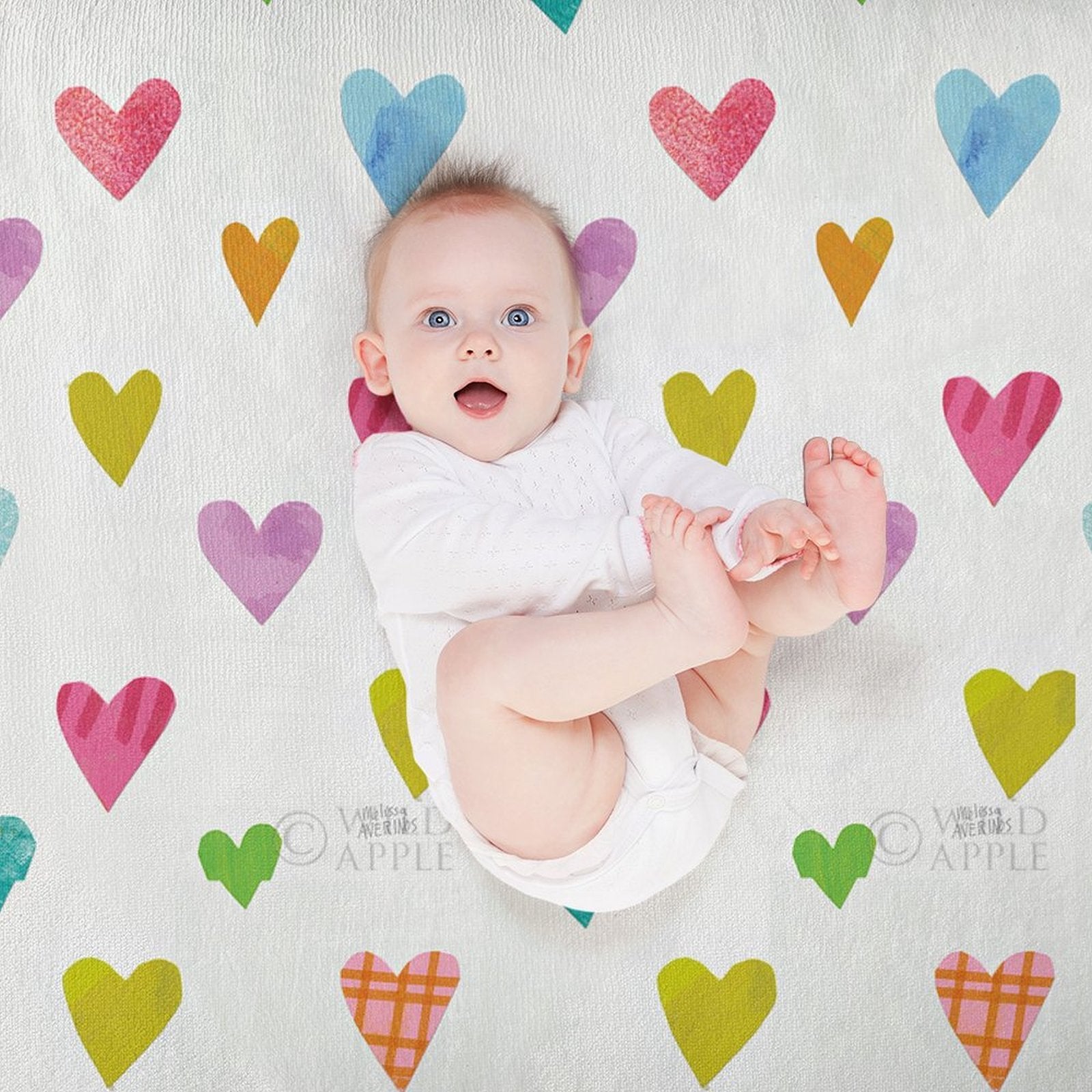 Baby on colorful heart fleece blanket, perfect for bed, sofa, couch, camping, or travel