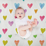 Baby on colorful heart fleece blanket, perfect for bed, sofa, couch, camping, or travel