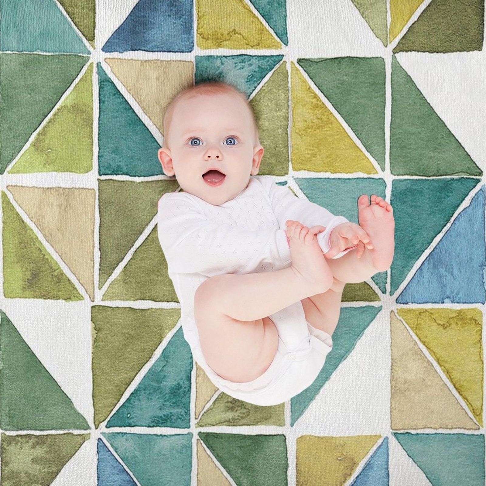 Baby on My Greenhouse Geo Lamb Wool Fleece Blanket. Green, blue & beige geometric design, perfect for bed or travel.