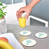 Customizable coasters with "YOUR DESIGN HERE" text, perfect for drinks at home or office, personalized design