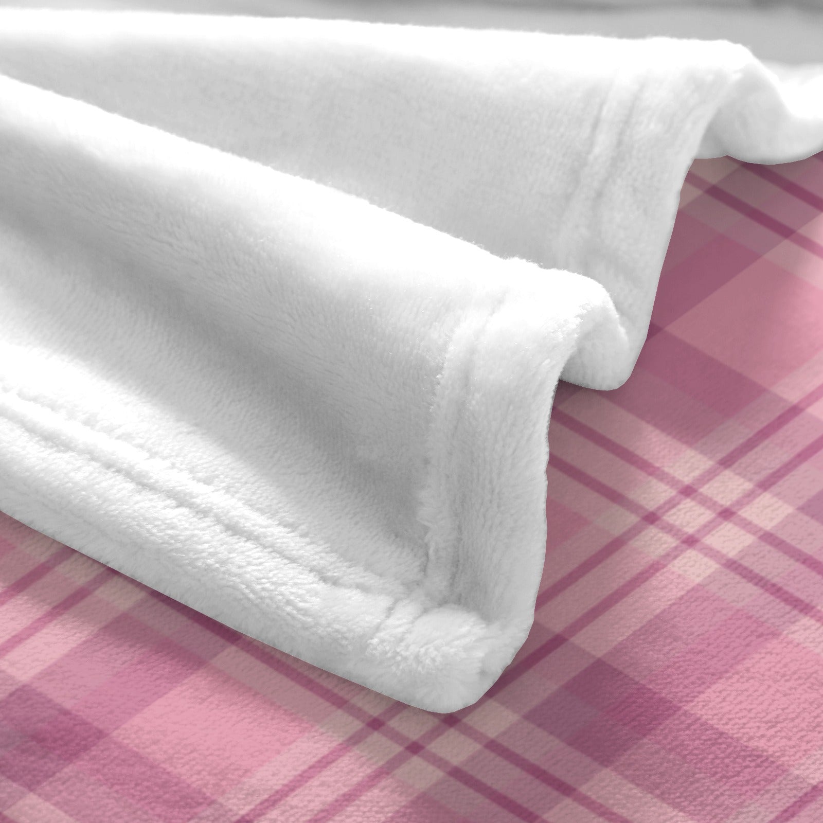 Pink buffalo plaid blanket with white fleece detail, USA made, soft and cozy home decor