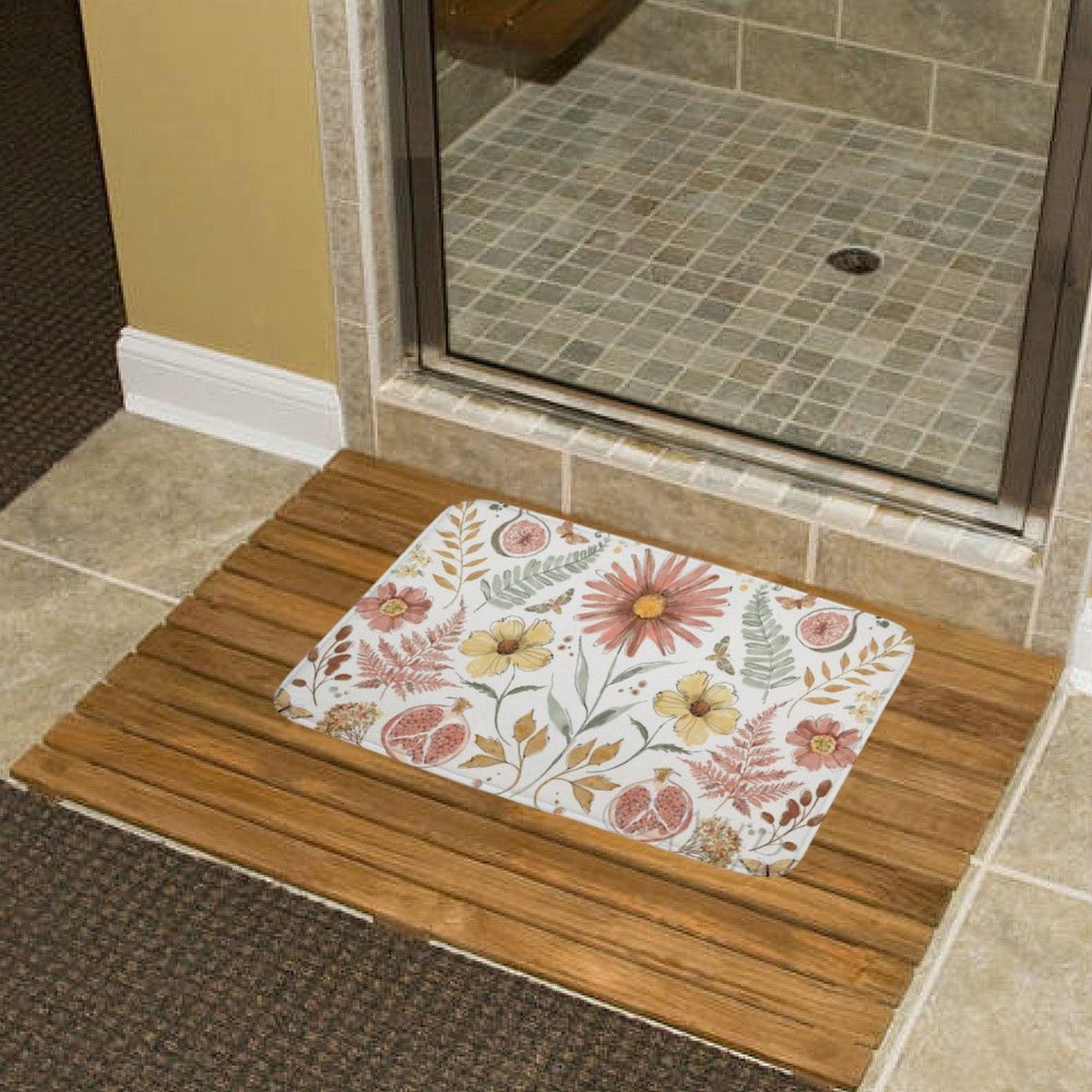 Coral floral bath rug with non-slip backing for bathroom; daisies and pomegranates design