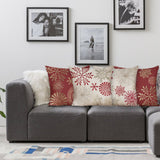 Cotton linen pillow cases with red and gold snowflake patterns on a sofa, decorative pillows for bedroom or living room decor