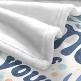 Coastal blue seashell flannel blanket detail with 'You are' design, soft polyester blanket