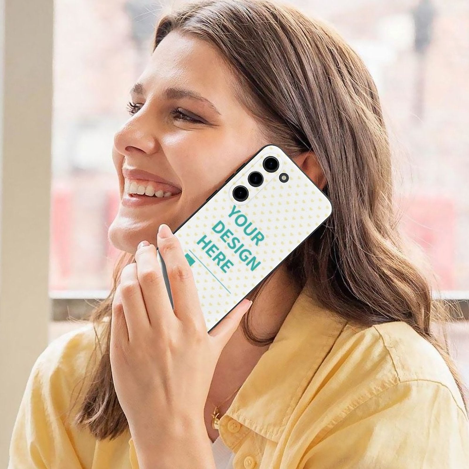 Custom Samsung Galaxy S23 case with 'YOUR DESIGN HERE' text, soft TPU material, held by smiling woman.