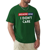 Men's green Breaking News I Don't Care t-shirt. Classic crew neck tee.