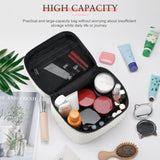 White lychee leather makeup bag with 'HIGH CAPACITY' text, filled with cosmetics, travel-friendly, makeup case organizer